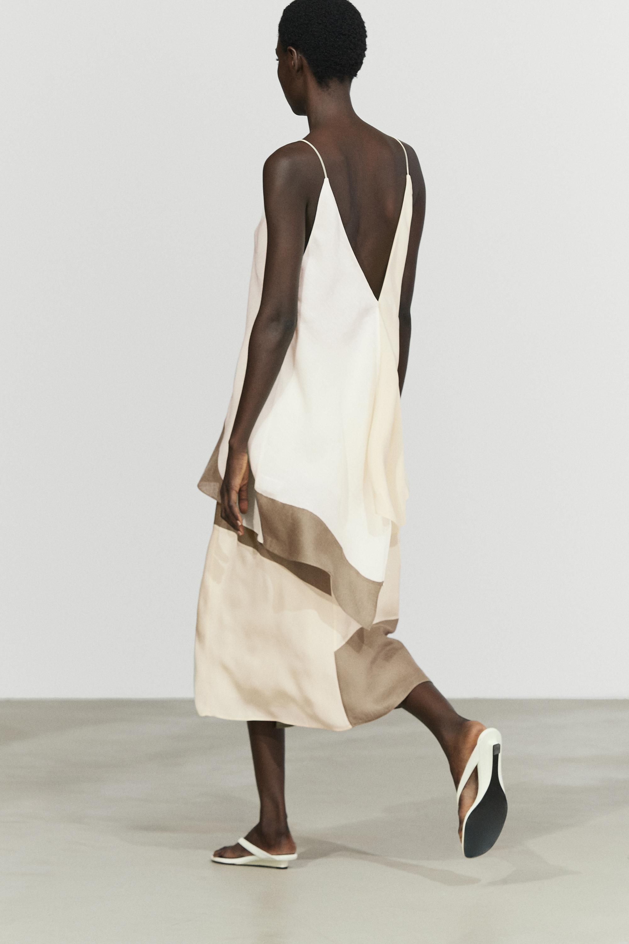 Asymmetric strappy flowing top